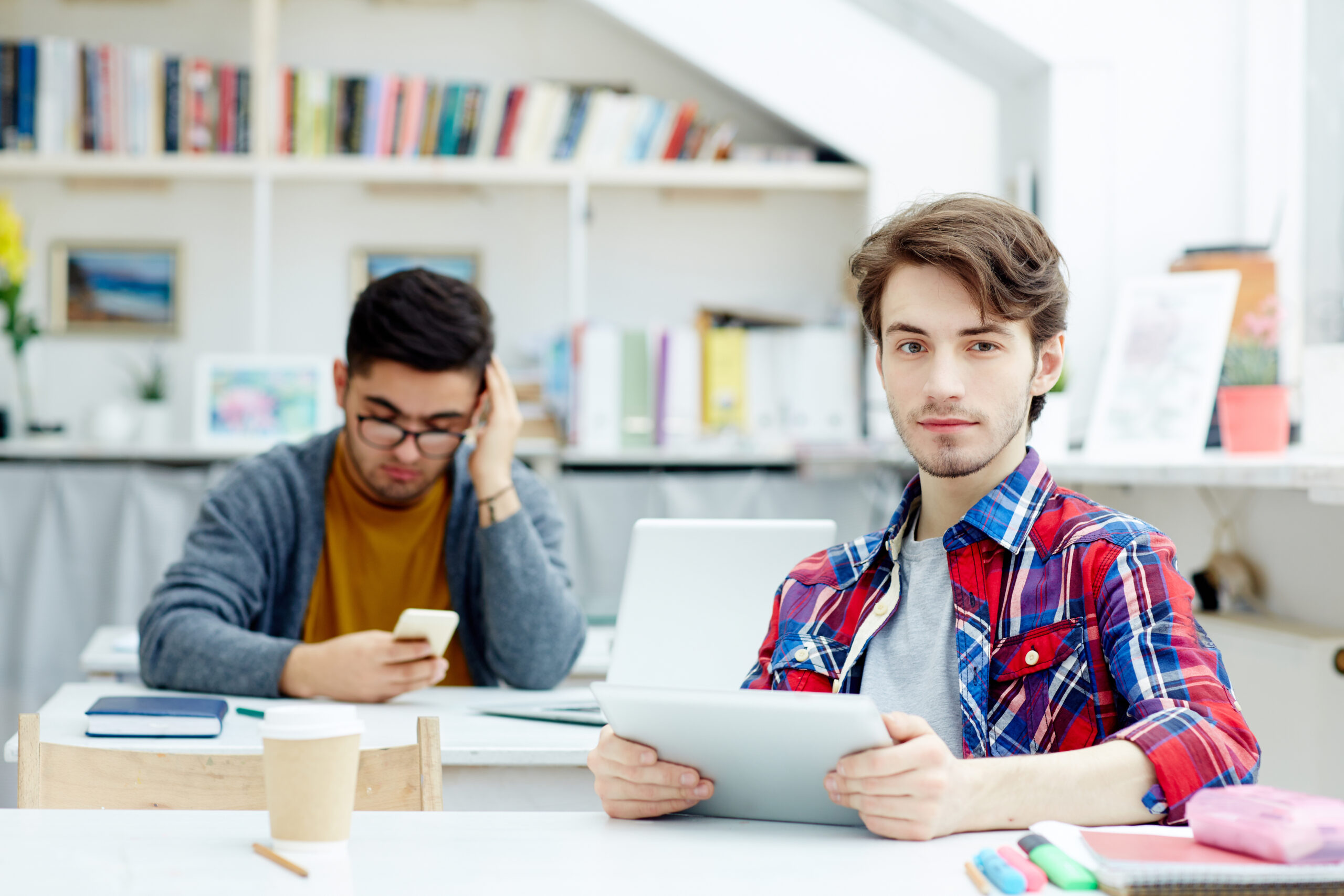 “College student managing studies and part-time online work.”
